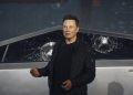 Tesla CEO Elon Musk introduces the Cybertruck at Tesla's design studio Thursday, Nov. 21, 2019, in Hawthorne, Calif. Musk is taking on the workhorse heavy pickup truck market with his latest electric vehicle. (AP Photo/Ringo H.W. Chiu)